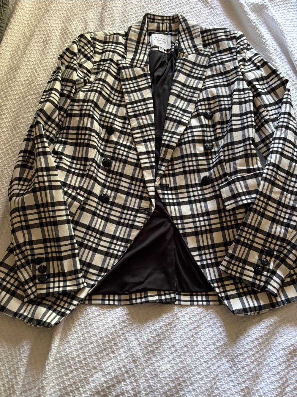 Women’s black and white plaid blazer